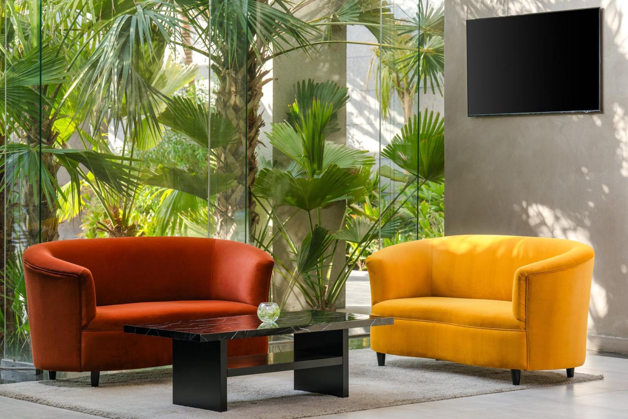 Carlton Al Moaibed Hotel Dammam Exterior foto A set of sofas